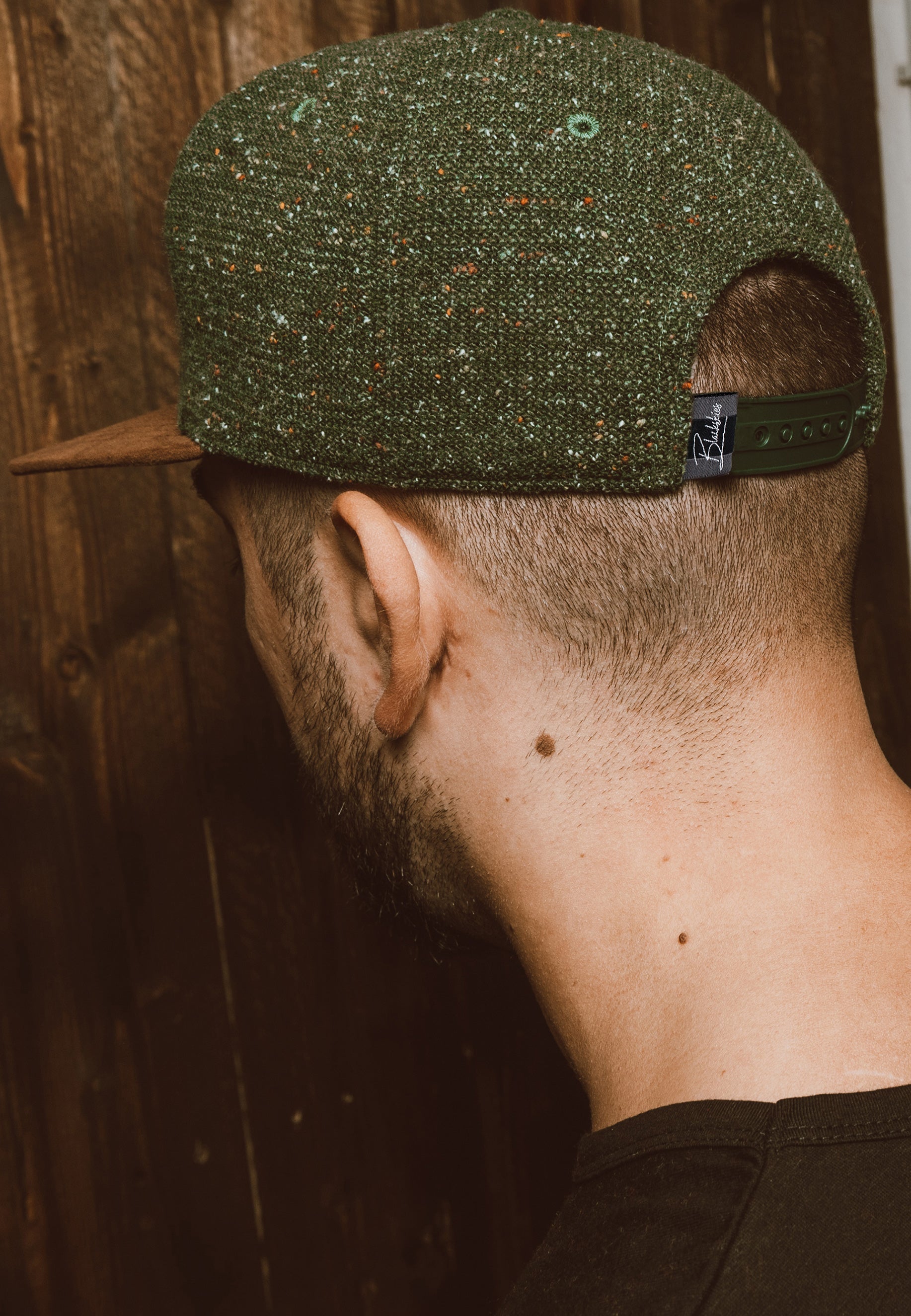 600000087-Blackskies-Obsidian-Snapback-Cap-Green-Model-Back