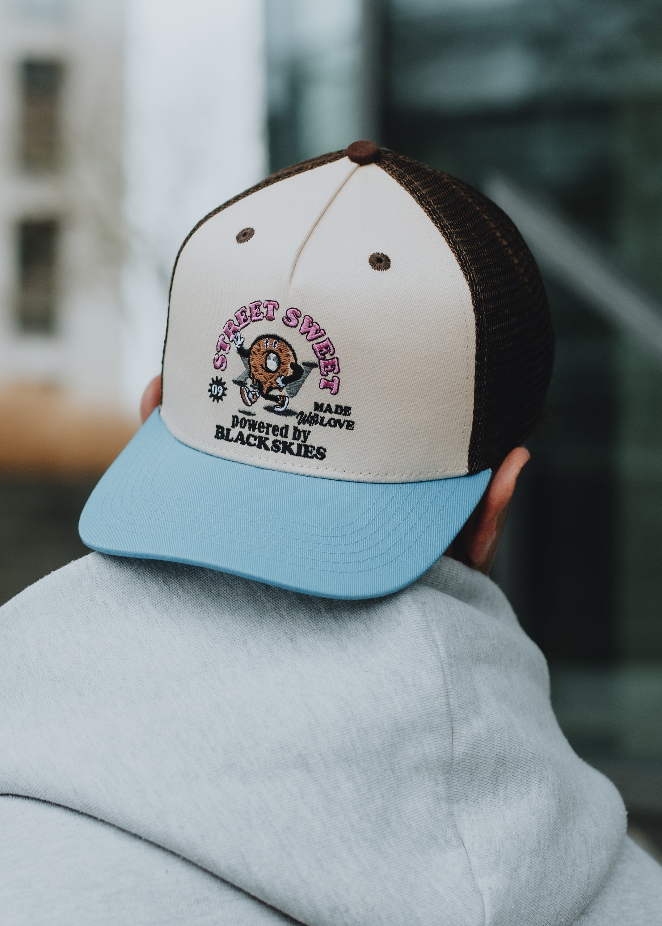 Blackskies-15th-Anniversary-Trucker-Cap-Donut-Model-2