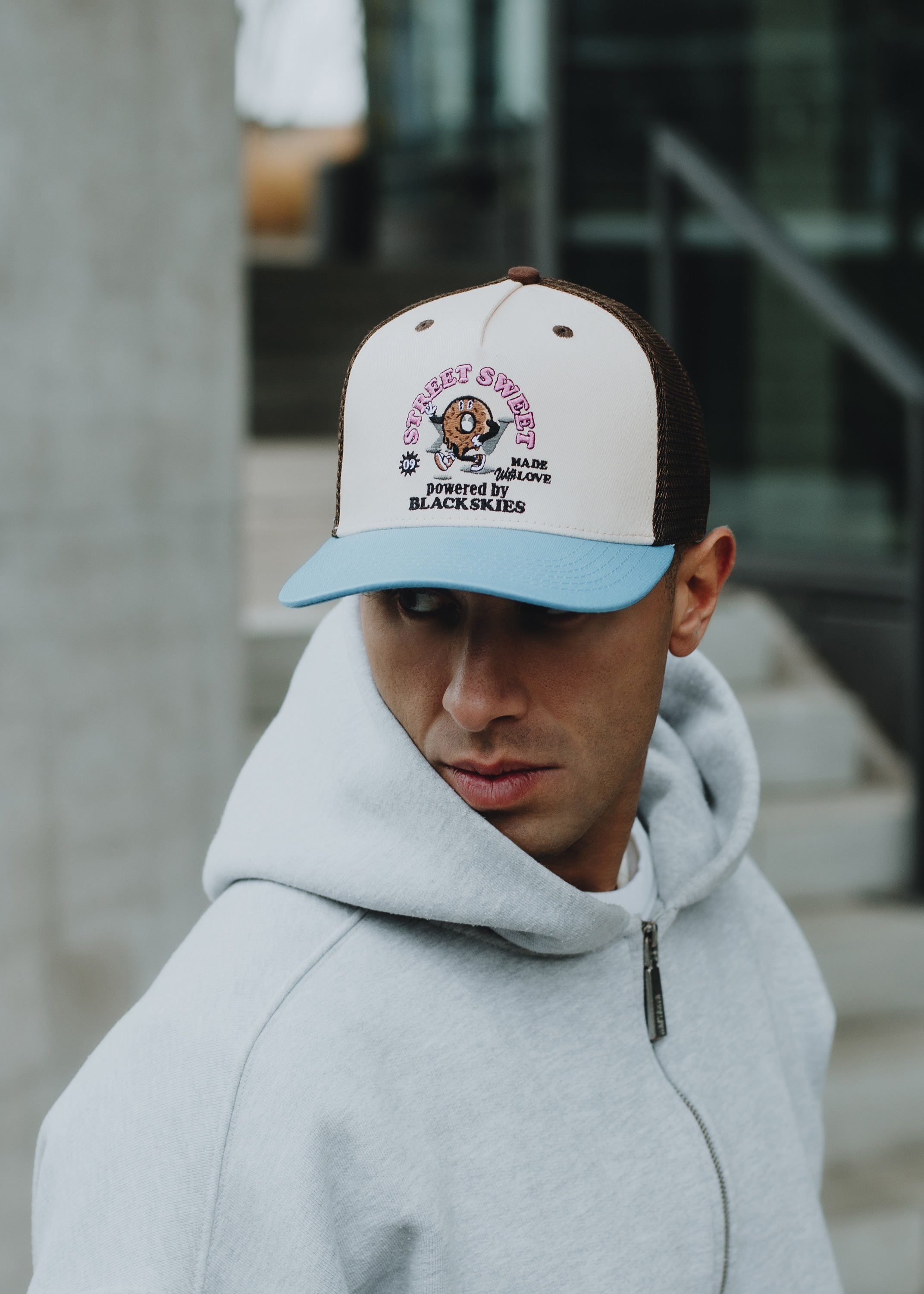 Blackskies-15th-Anniversary-Trucker-Cap-Donut-Model