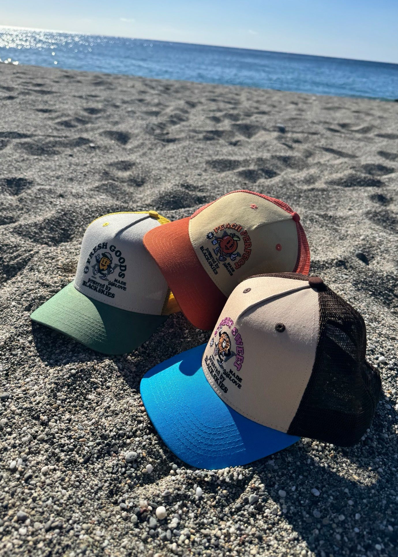 Blackskies-15th-Anniversary-Trucker-Cap-Peach-Set