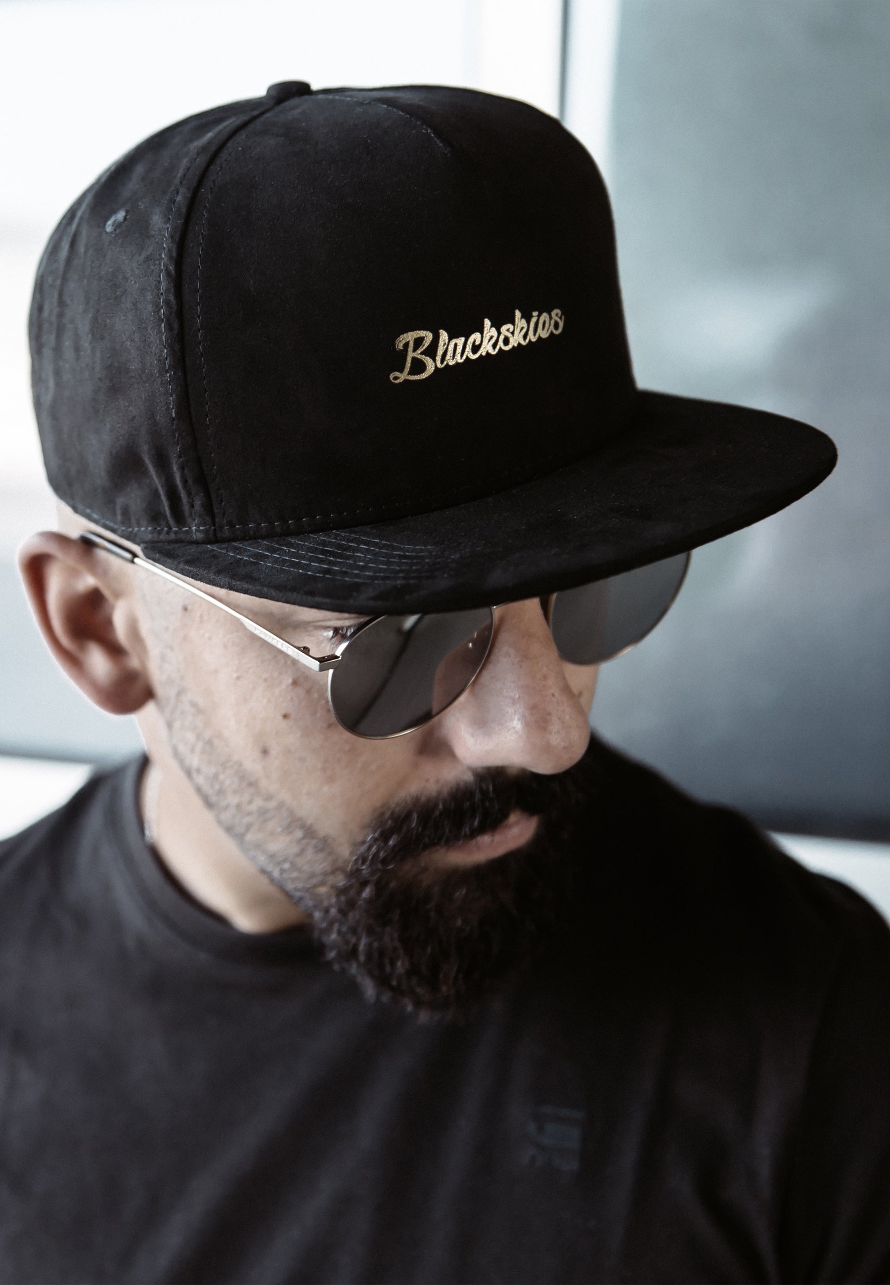 Blackskies-Aegis-Snapback-Cap-Suede-Strap-Model-Black-Gold-2
