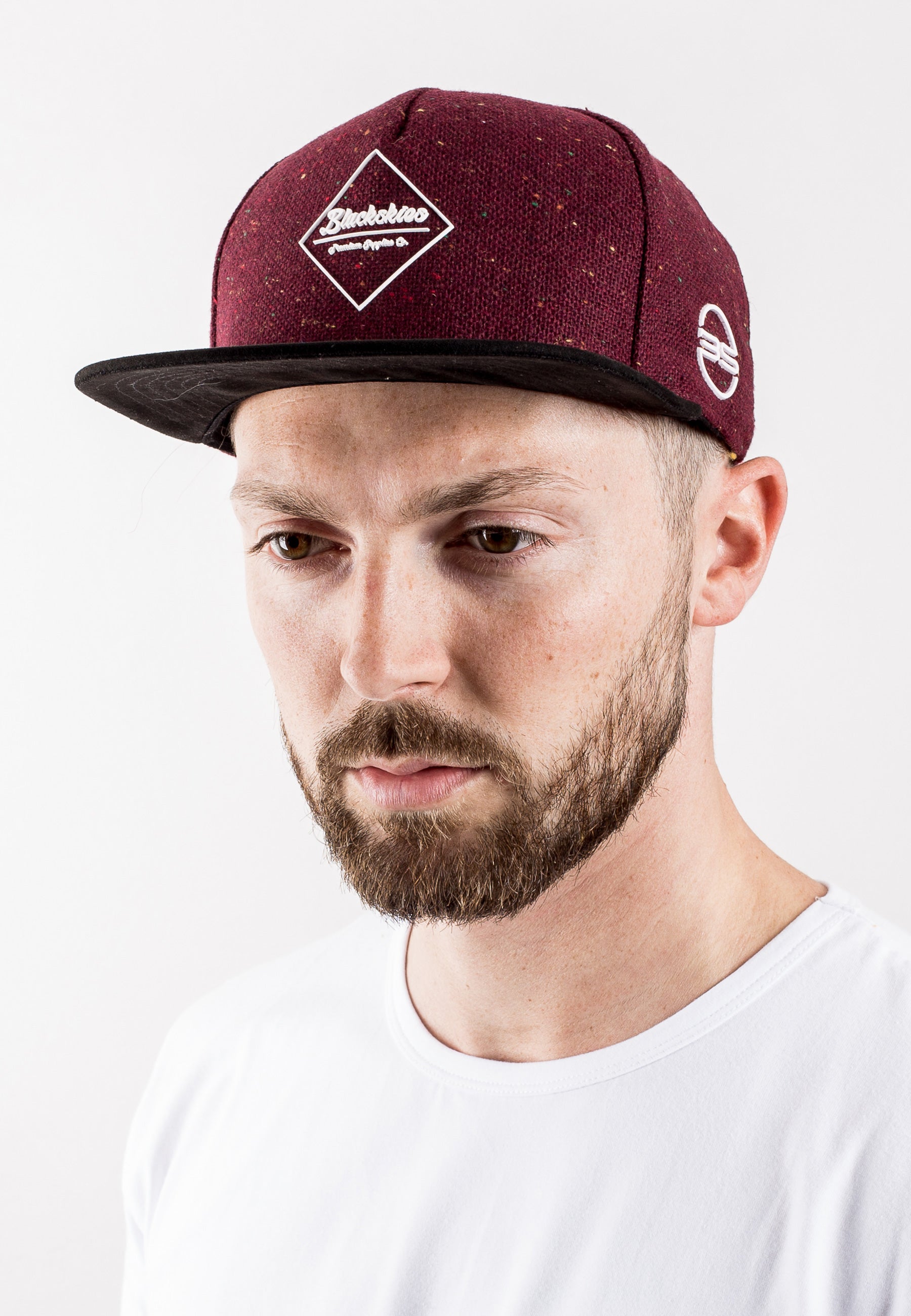 Blackskies-Ares-Premium-Snapback-Cap-Red-Speckle-Black-Model-Studio-Front
