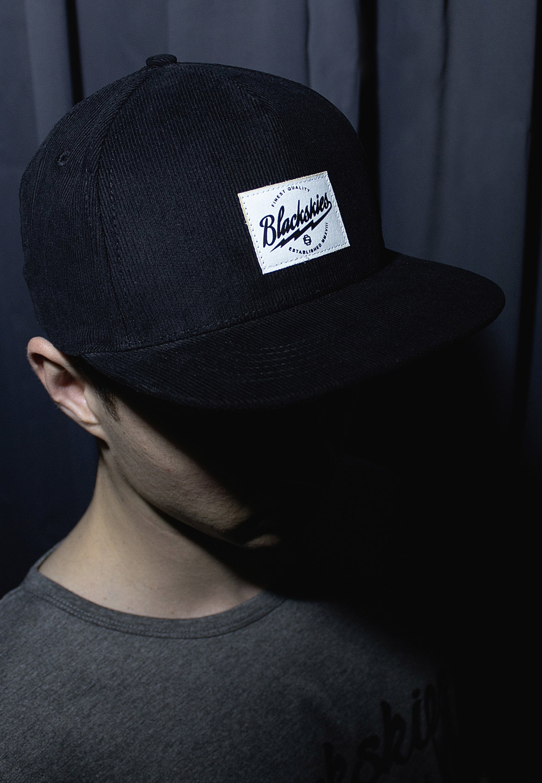 Blackskies-Ebony-Snapback-Cap-Black-Cord-Hat-Model