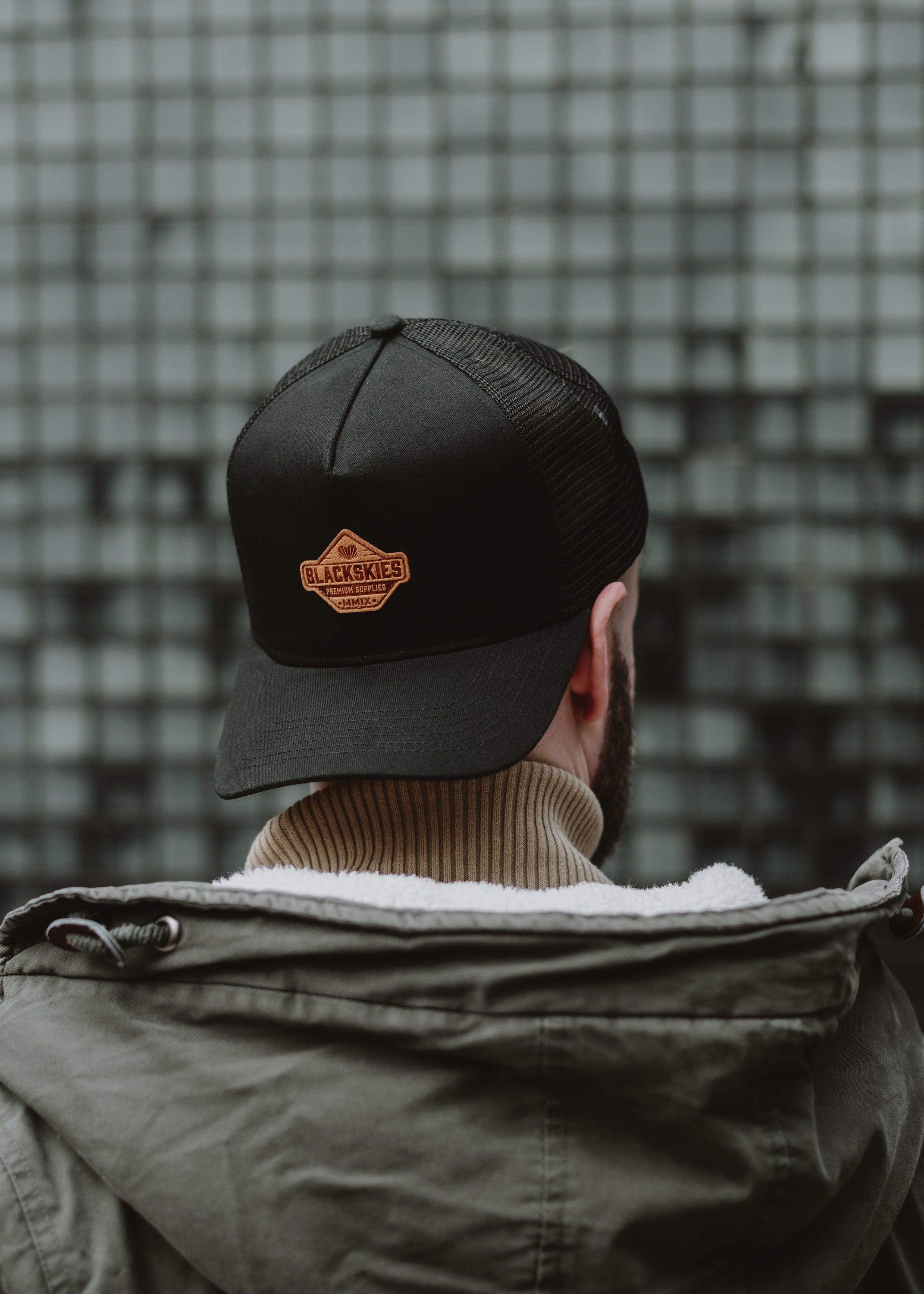 Blackskies-Essentials-Trucker-Cap-Black-Black-Brown-Model-2