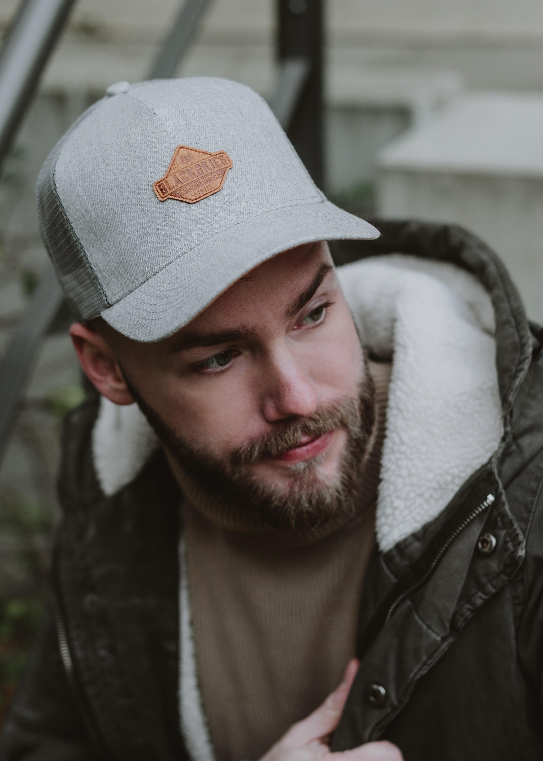 Blackskies-Essentials-Trucker-Cap-Grey-Grey-Brown-Model