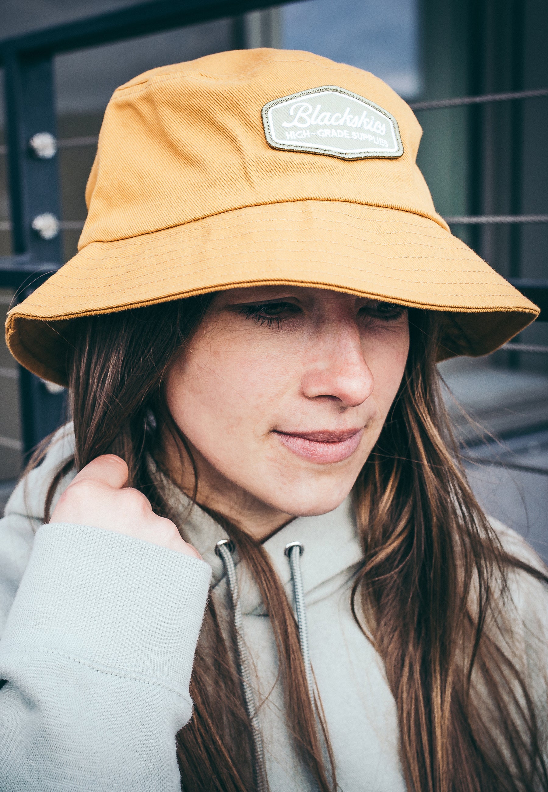 Blackskies-Oasis-Bucket-Hat-Mustard-Yellow-Fisher-Hat-Bob-Lovely-Model