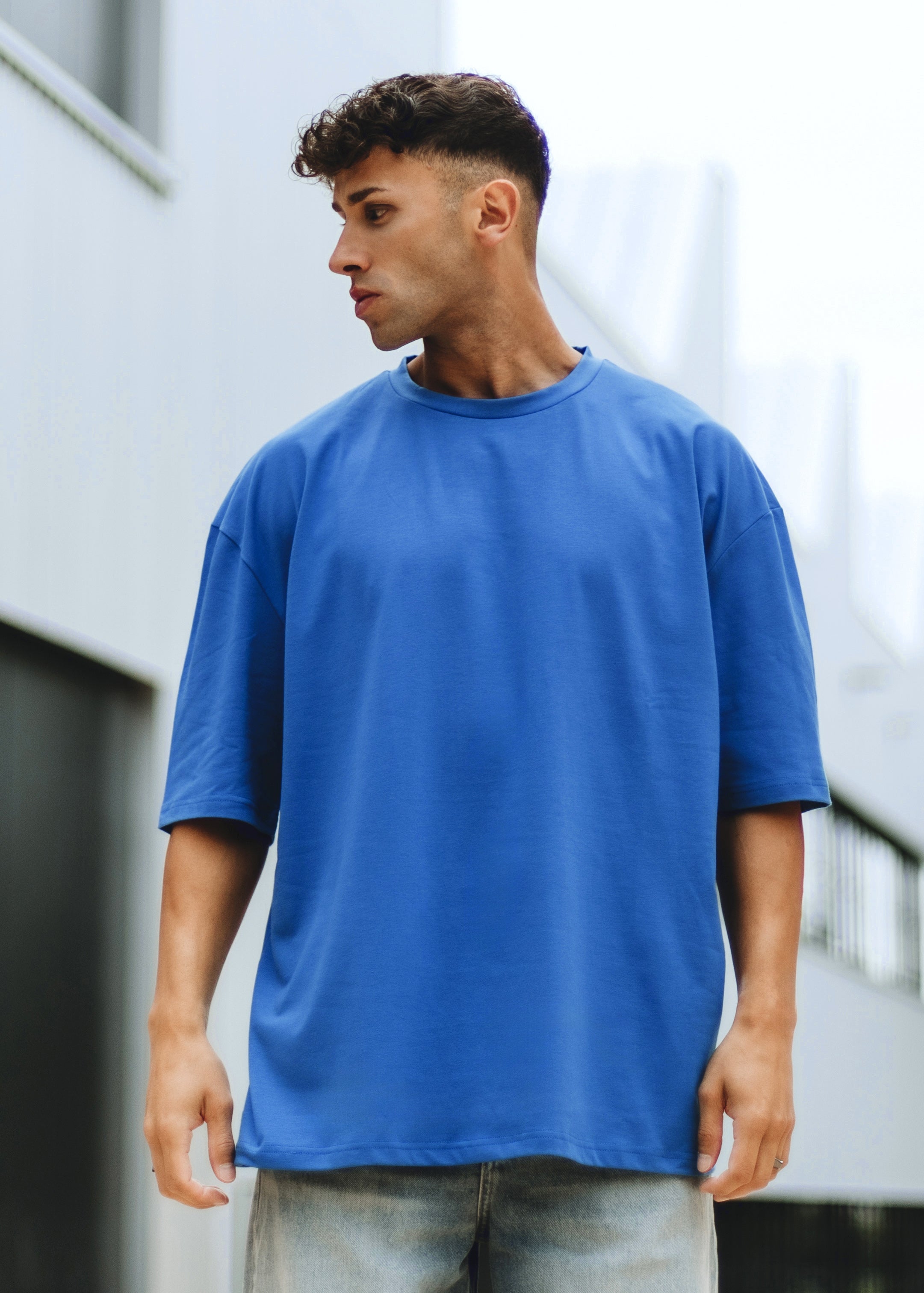Blackskies-Oversized-T-Shirt-Blue-Men-Model-Outdoor-2