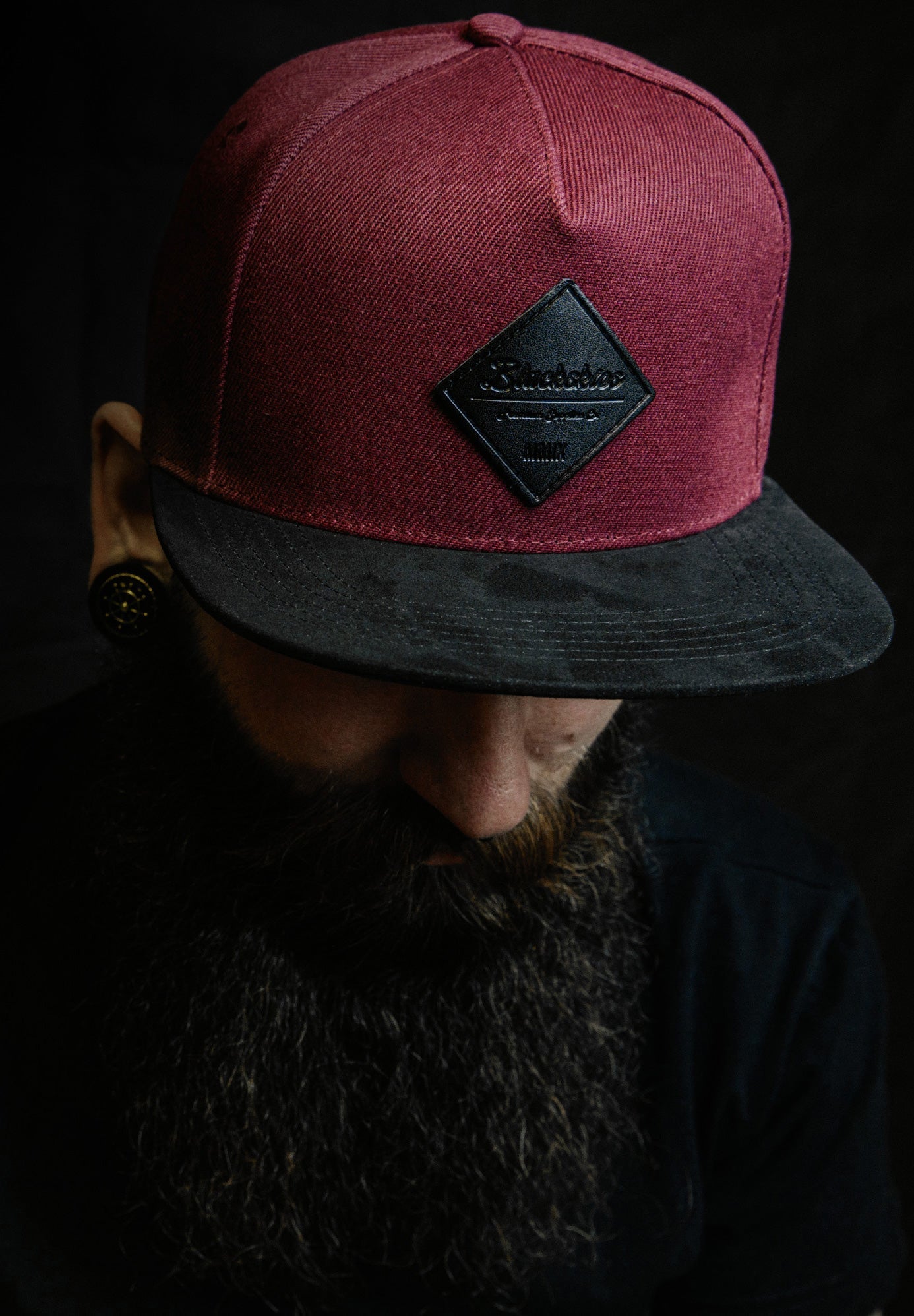 Blackskies-Port-Townsend-Snapback-Cap-Maroon-Black-Model-Cropped