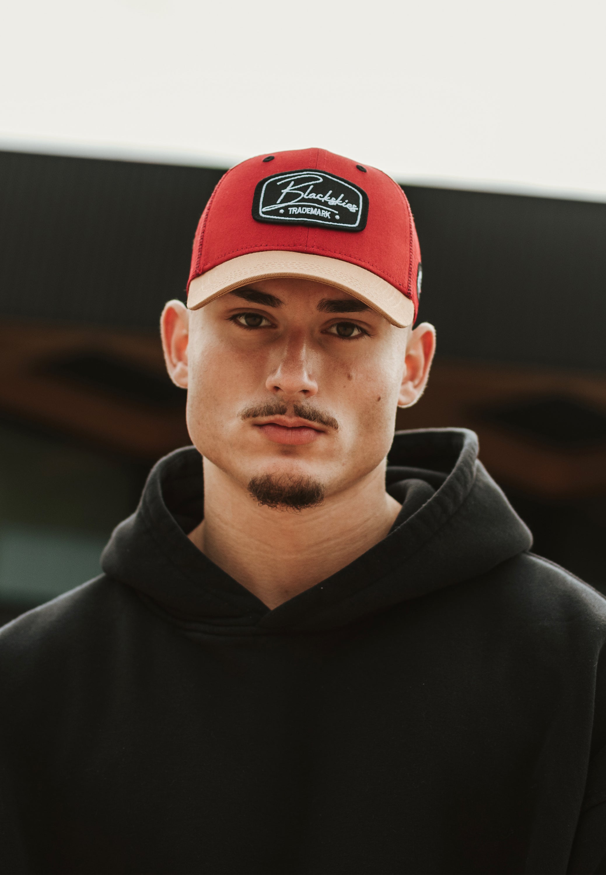 Blackskies-Race-Baseball-Cap-Red-Gold-Model