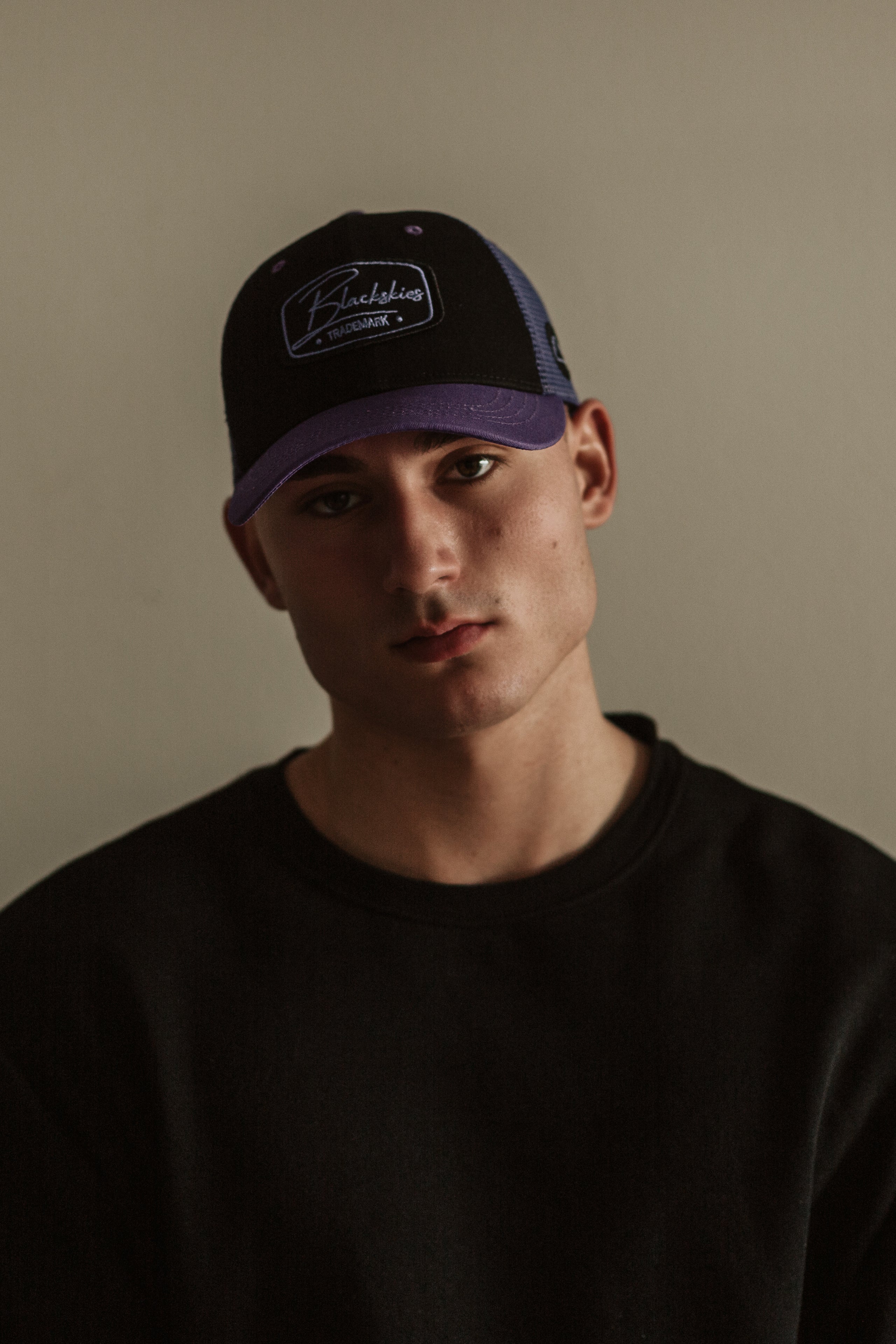 Blackskies-Race-Baseball-Cap-Trucker-Mesh-Mens-Womens-Lilac-Black-Model