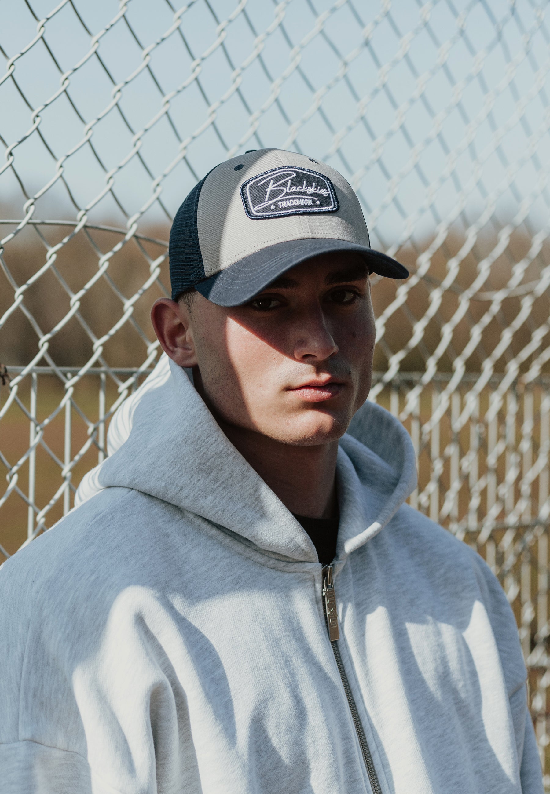 Blackskies-Race-Baseball-Cap-Trucker-Mesh-Womens-Mens-Grey-Navyblue-Model-4