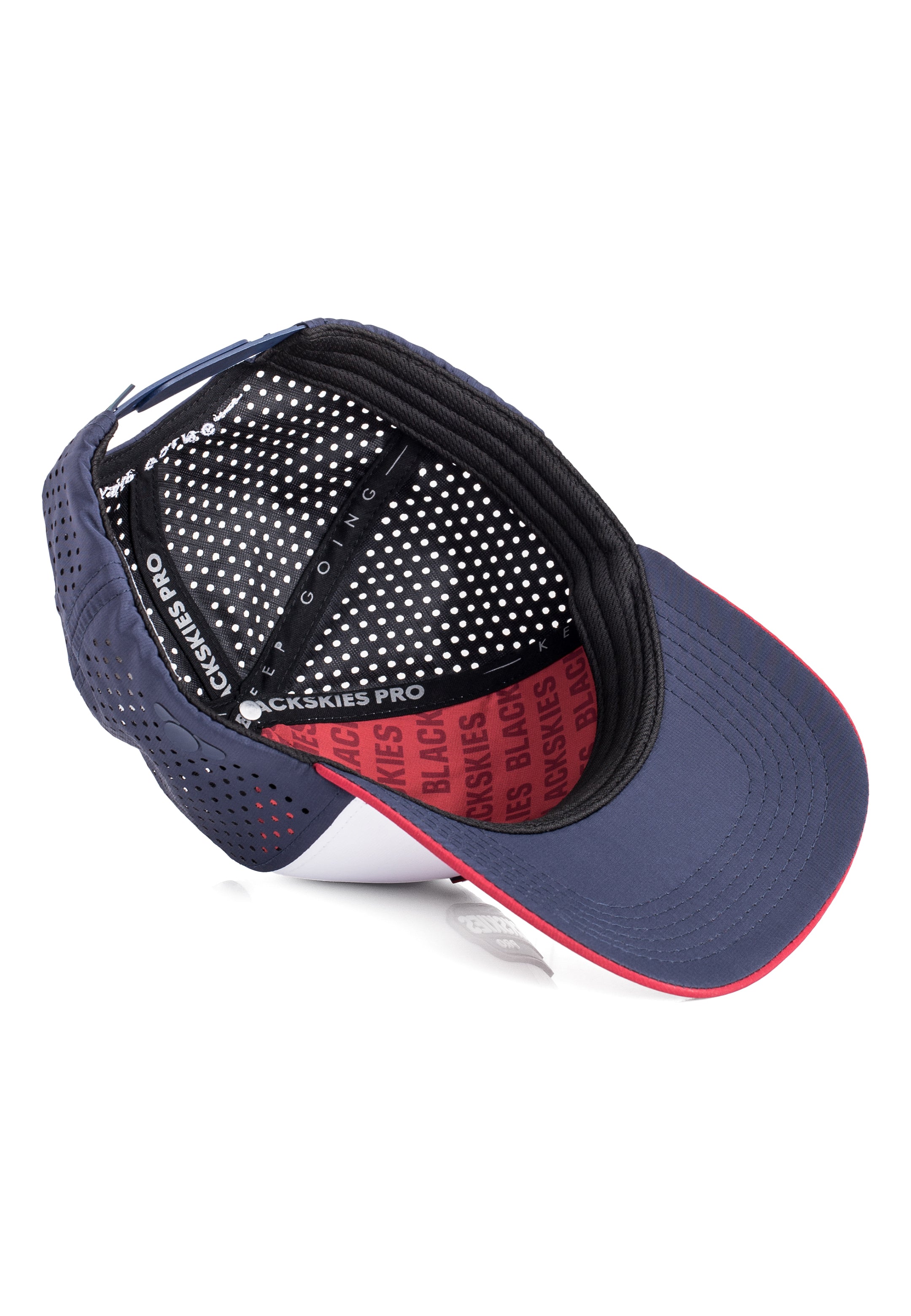 Navy blue cap with red interior and black brim on a white background
