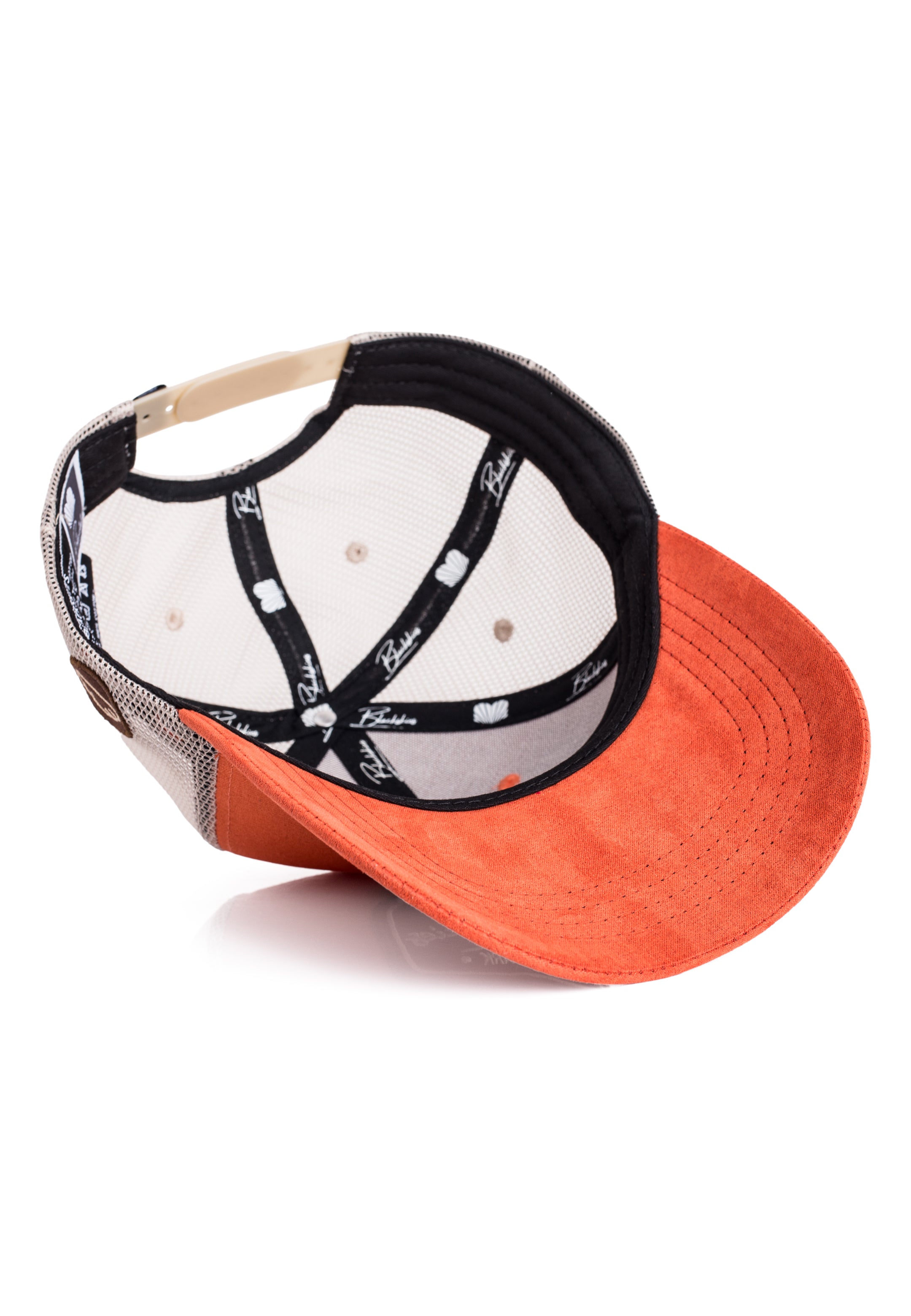 Baseball cap with white front panel, black brim, and orange back on a white background