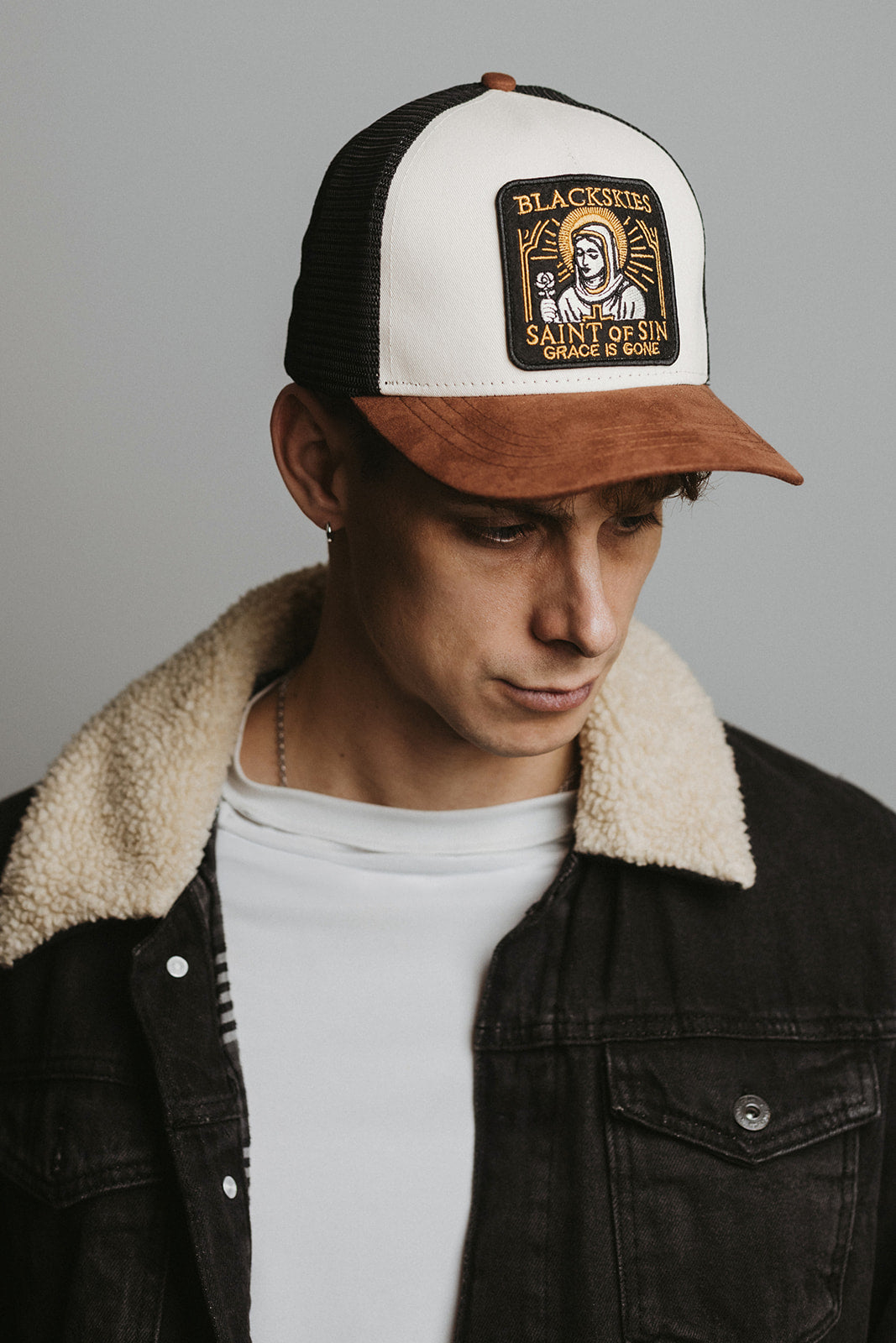 Saint of Sin Trucker Cap